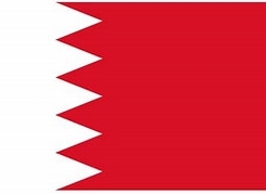 [ai] The flag of Bahrain featuring a white serrated band on the left side and a red field on the right.